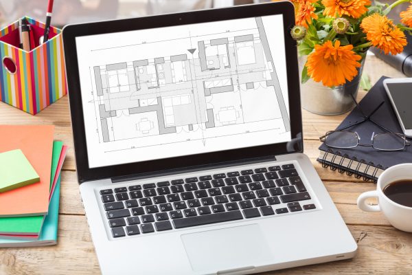 Building project blueprint plan on a computer screen. Architect designer office desk, Real estate, construction concept,